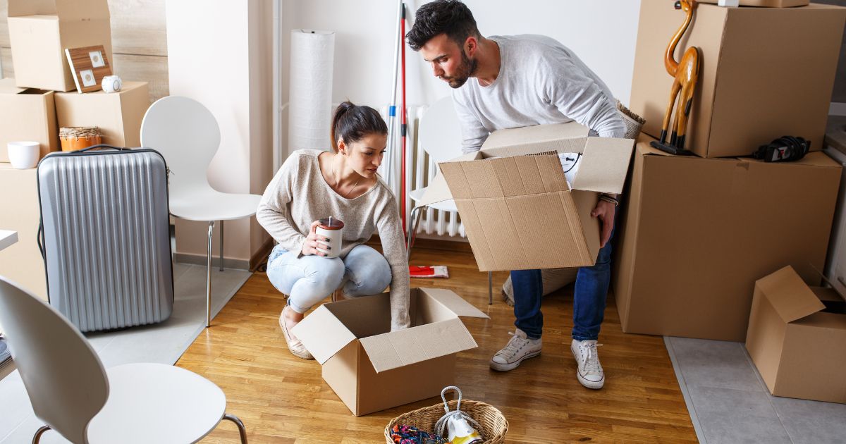 couple packing their belongings