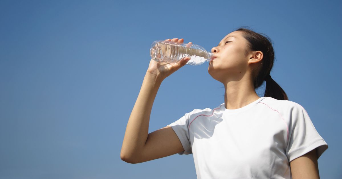 Person drinking water after moving house