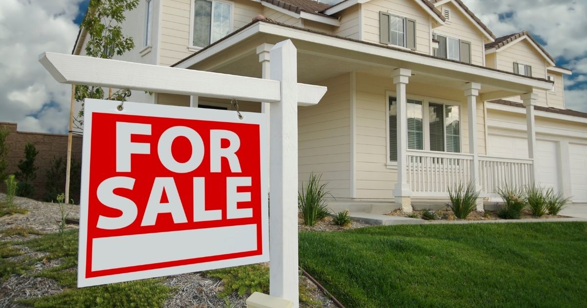 Home with for sale sign - MyStackBox Home with for sale sign